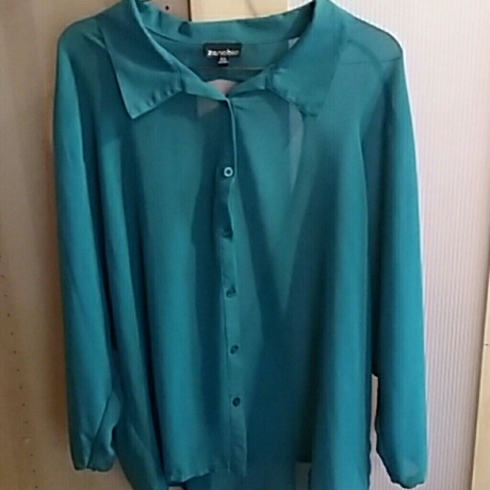 A turquoise blouse with the back out